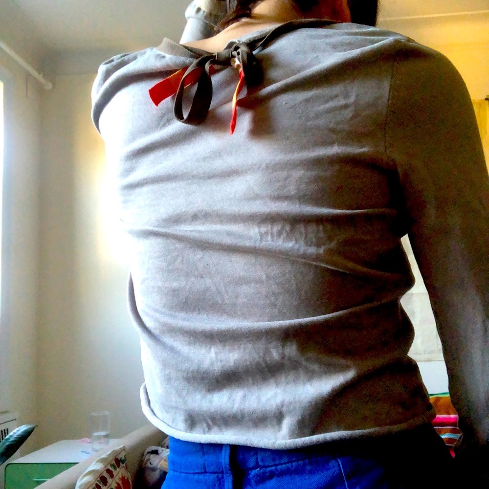 Orla Kiely muted spring sweater with colorful tie